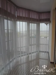 Tulle on the balcony in the apartment photo