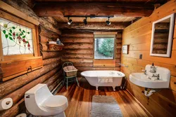 Bathroom design in a wooden house with tiles