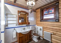 Bathroom design in a wooden house with tiles