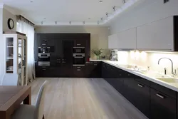 White kitchen dark floor design