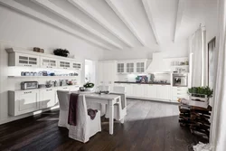 White kitchen dark floor design
