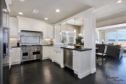 White kitchen dark floor design