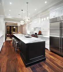 White kitchen dark floor design