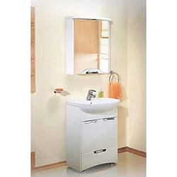 Bathroom Sink With Cabinet And Mirror Photo