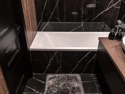 Hamam foto dizaynında qara və ağ mərmər plitələr