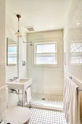 Bathroom design with window and shower
