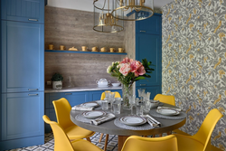 Yellow-blue kitchen in the interior photo
