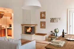 Corner fireplace in the living room in the interior photo
