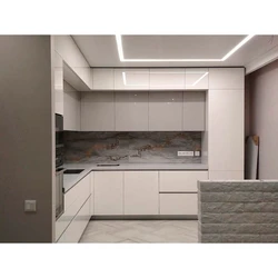 Photo of a kitchen up to the ceiling at an angle