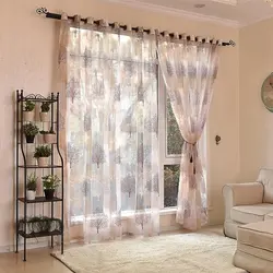 Тарҳи tulle барои меҳмонхона дар сабки муосир