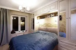 Bedroom design 12 sq m with balcony and wardrobe