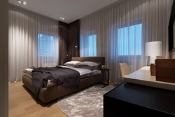 Corner bedroom with two windows photo