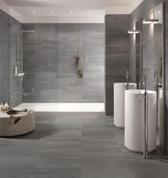 Gray porcelain tiles in the bathroom design photo