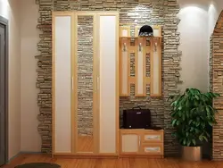 Finishing the apartment with stone and wallpaper photo