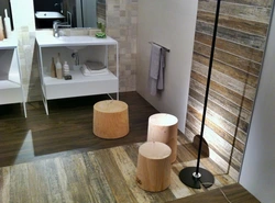 In the bathroom there are laminate tiles on the floor photo
