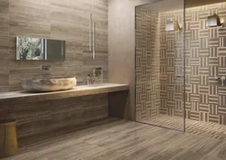 In The Bathroom There Are Laminate Tiles On The Floor Photo