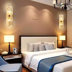 Sconce for a bedroom in a modern style in the interior photo