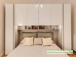 Small Bedroom With A Large Bed And Wardrobe Photo