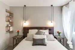 How to position the bed in the bedroom relative to the window photo