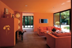 Orange living room photo