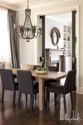 Black chairs in the kitchen interior photo