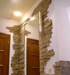 Artificial stone for interior wall decoration in the hallway in the interior