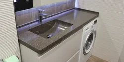 Столешница из искусственного камня в ванной комнате фото