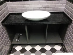 Countertop made of artificial stone in the bathroom photo