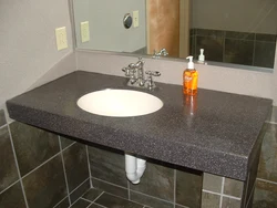 Countertop made of artificial stone in the bathroom photo