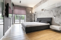 What kind of floors are in the bedroom photo