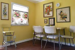 Kitchen design with paintings on the wall