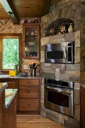 Kitchen with stove in a country house design photo