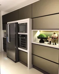 Freestanding refrigerator in the kitchen interior