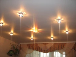 Design of lamps on a suspended ceiling in the bedroom