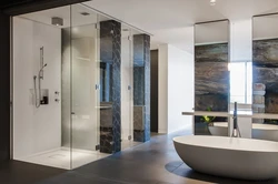 Bath and shower in large bathroom design