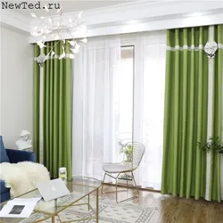 Green curtains in the living room interior