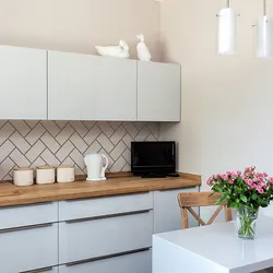 Wallpaper in the kitchen interior for white photo real