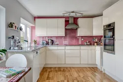 Kitchen interior with pink tiles