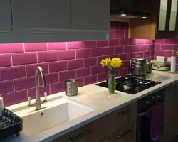 Kitchen interior with pink tiles