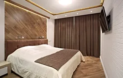 Ламинат на стену в спальне фото