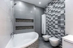 Bathroom design with gray washing machine