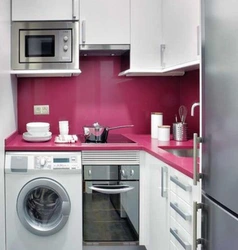 Interior Of A Small Kitchen With A Washing Machine