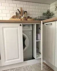 Interior of a small kitchen with a washing machine