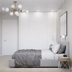 Bedroom design with gray bed and wardrobe