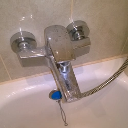 Photo Of A Water Tap In The Bathroom