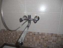 Photo of a water tap in the bathroom