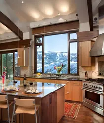 Kitchen in a house with panoramic windows design photo