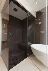 Bath design with black shower cabin