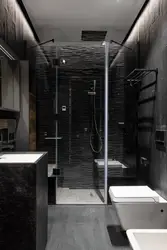 Bath design with black shower cabin