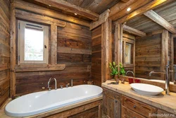 Bathroom with toilet in a wooden house design photo